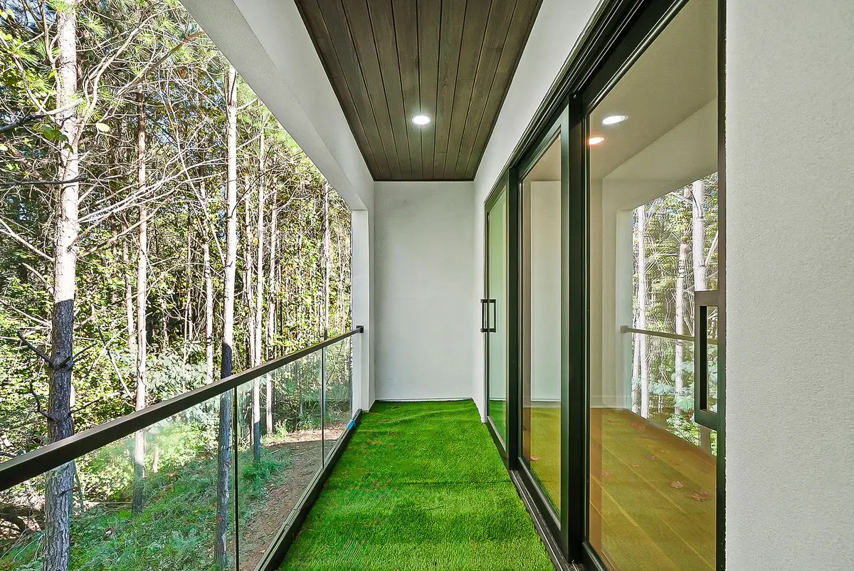Covered balcony overlooking the trees