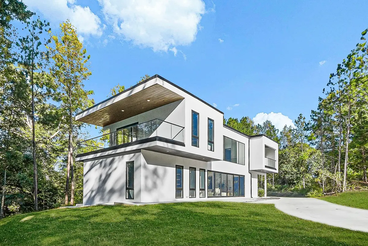 Exterior with cantilevered upper level