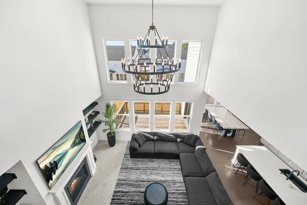 Two-story family room seen from the upper landing